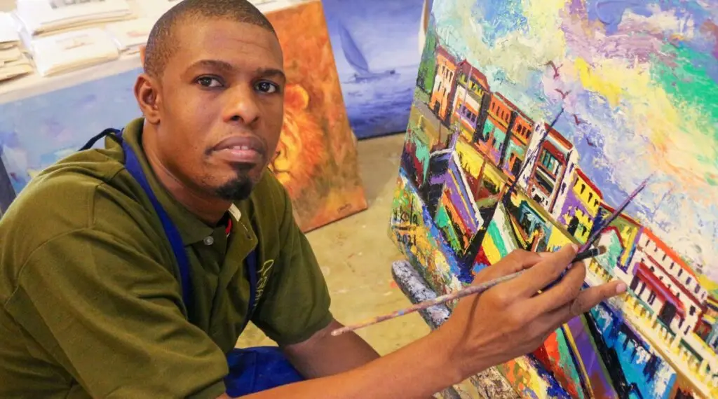 Artists and guests at an art exhibition in Zanzibar